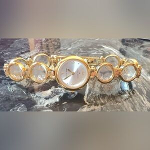 Anne Klein Women's Quartz Gold Tone Bracelet Watch with Crystals